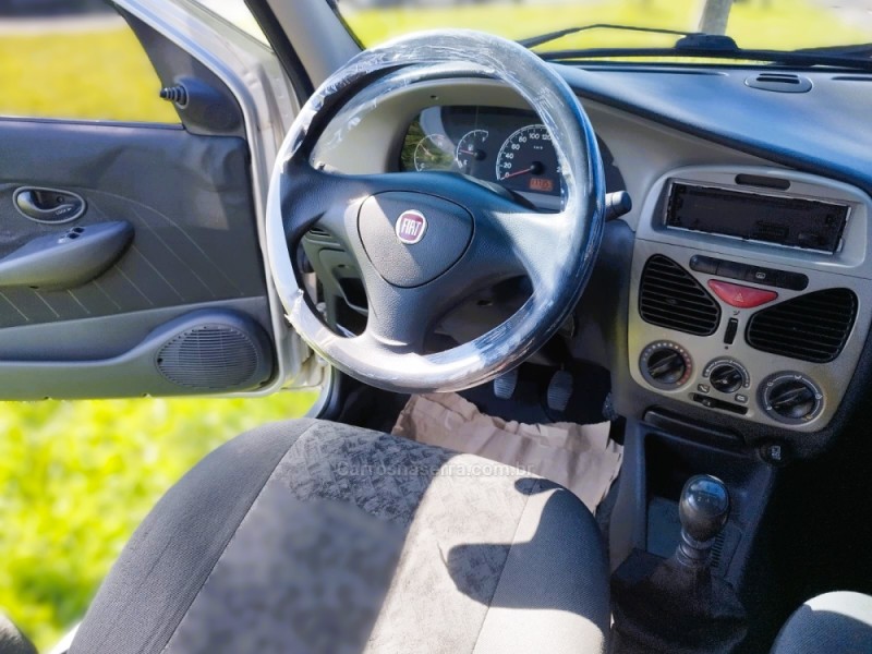 PALIO 1.0 MPI FIRE CELEBRATION ECONOMY 8V FLEX 4P MANUAL - 2009 - NOVO HAMBURGO