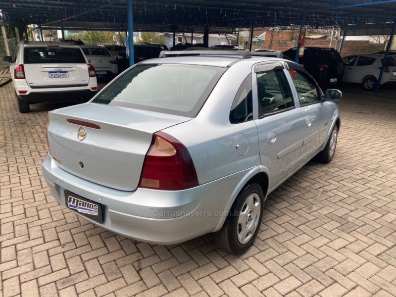 CORSA 1.4 MPFI PREMIUM SEDAN 8V FLEX 4P MANUAL - 2011 - CANELA