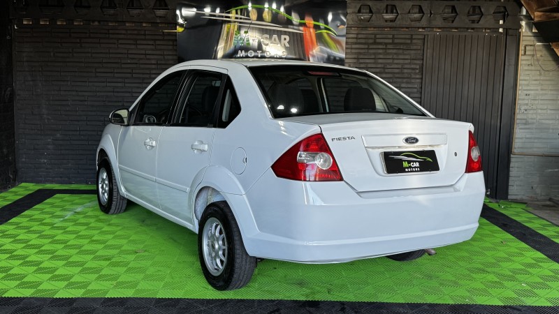 FIESTA 1.0 MPI SEDAN 8V FLEX 4P MANUAL - 2009 - FELIZ