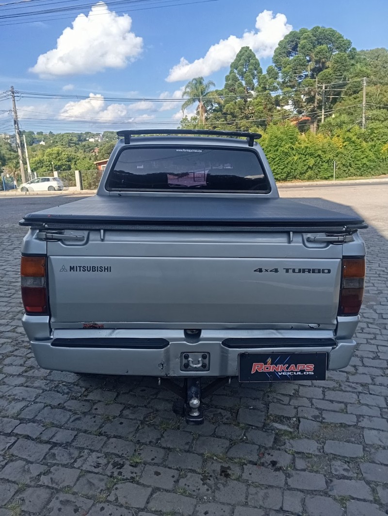 L200 2.5 GLS 4X4 CD 8V TURBO DIESEL 4P MANUAL - 2004 - CAXIAS DO SUL