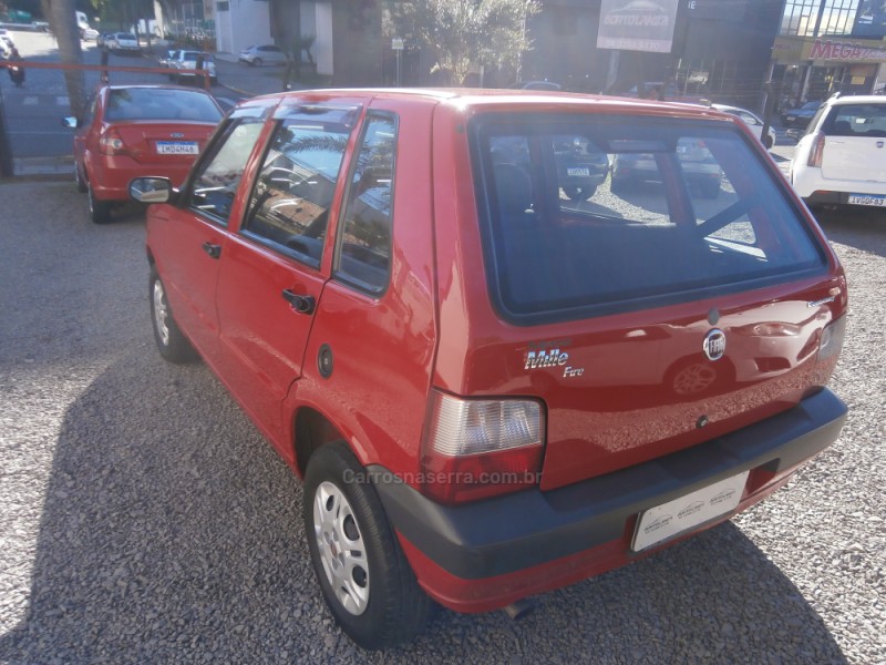 UNO 1.0 MPI MILLE FIRE ECONOMY 8V FLEX 4P MANUAL - 2010 - FARROUPILHA
