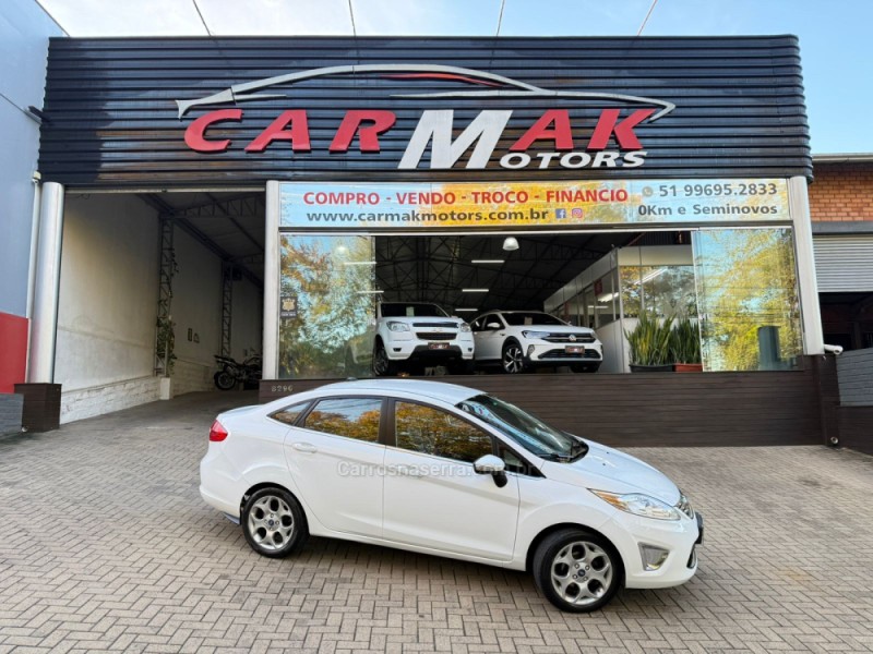 fiesta 1.6 se sedan 16v flex 4p manual 2013 dois irmaos