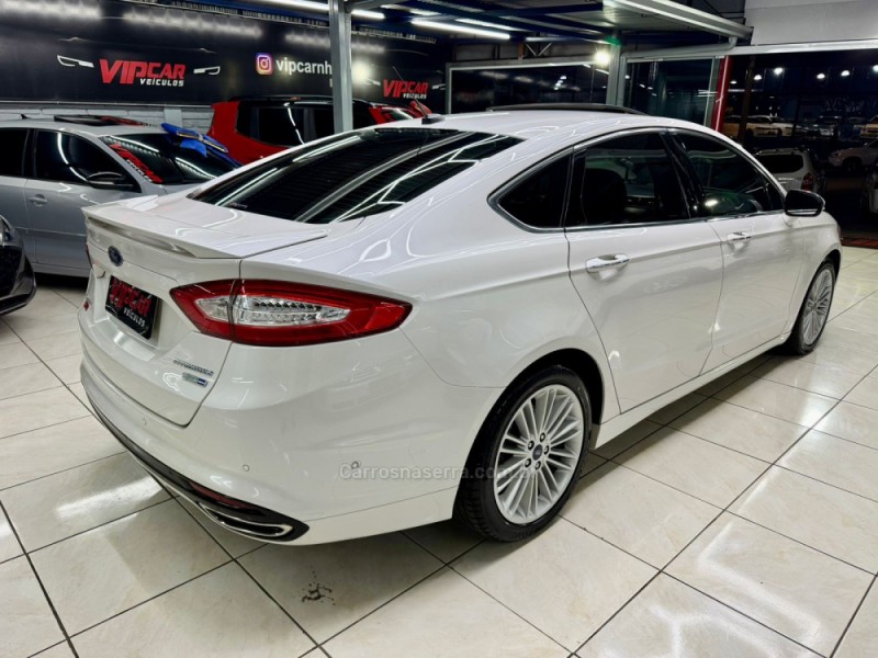 FUSION 2.0 TITANIUM PLUS AWD 16V GASOLINA 4P AUTOMÁTICO - 2014 - ESTâNCIA VELHA