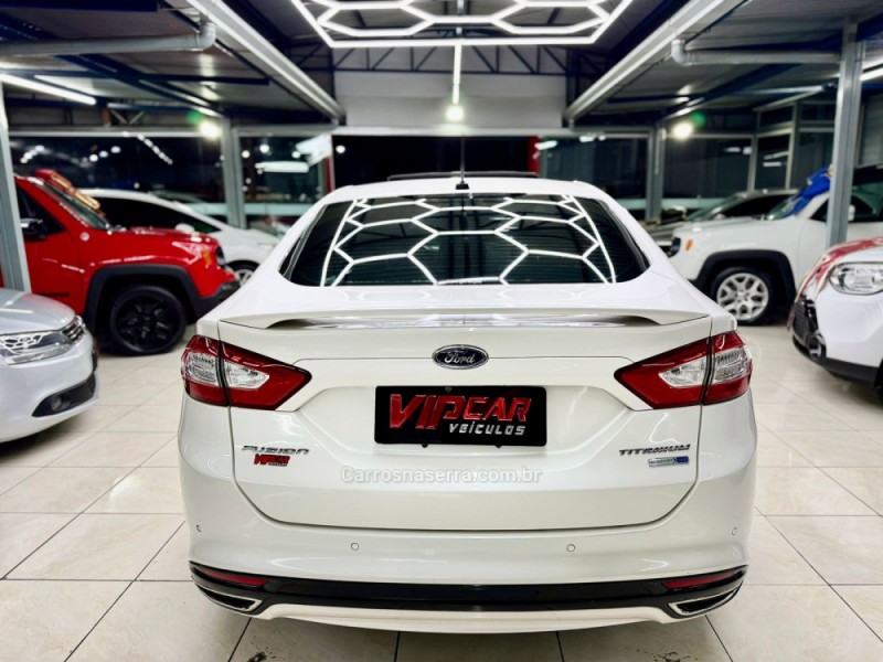 FUSION 2.0 TITANIUM PLUS AWD 16V GASOLINA 4P AUTOMÁTICO - 2014 - ESTâNCIA VELHA