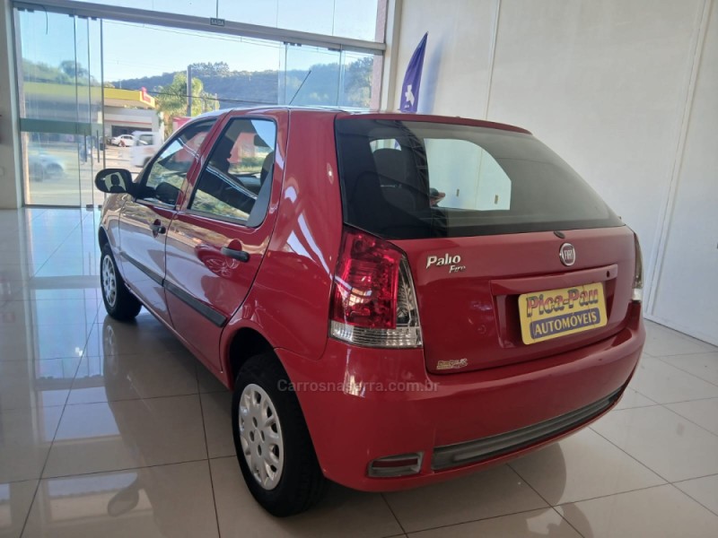 PALIO 1.0 MPI FIRE CELEBRATION 8V FLEX 4P MANUAL - 2014 - NOVA PETRóPOLIS