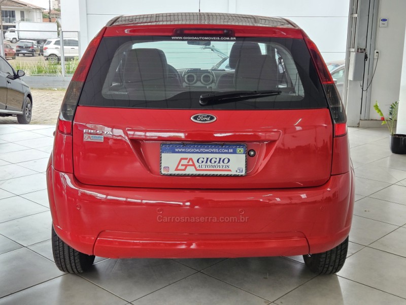 FIESTA 1.6 ROCAM HATCH 8V FLEX 4P MANUAL - 2013 - TAPEJARA