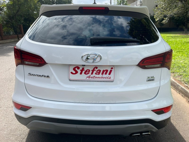 SANTA FÉ 3.3 MPFI 4X4 7 LUGARES V6 270CV GASOLINA 4P AUTOMÁTICO - 2019 - FELIZ