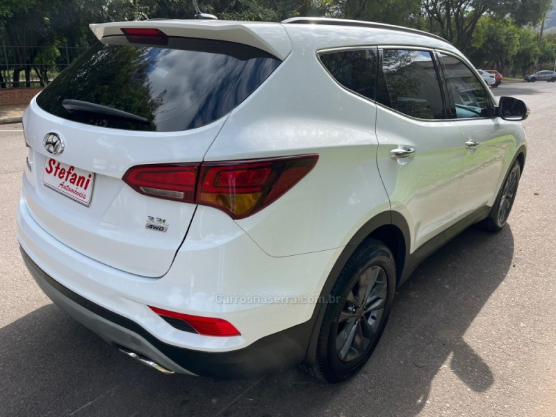 SANTA FÉ 3.3 MPFI 4X4 7 LUGARES V6 270CV GASOLINA 4P AUTOMÁTICO - 2019 - FELIZ