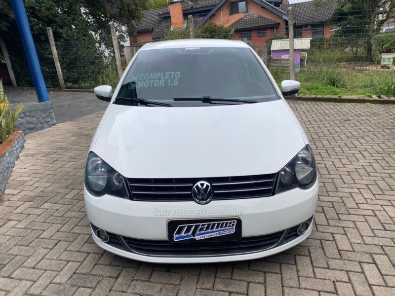 POLO SEDAN 1.6 MI COMFORTLINE 8V FLEX 4P MANUAL - 2013 - CANELA