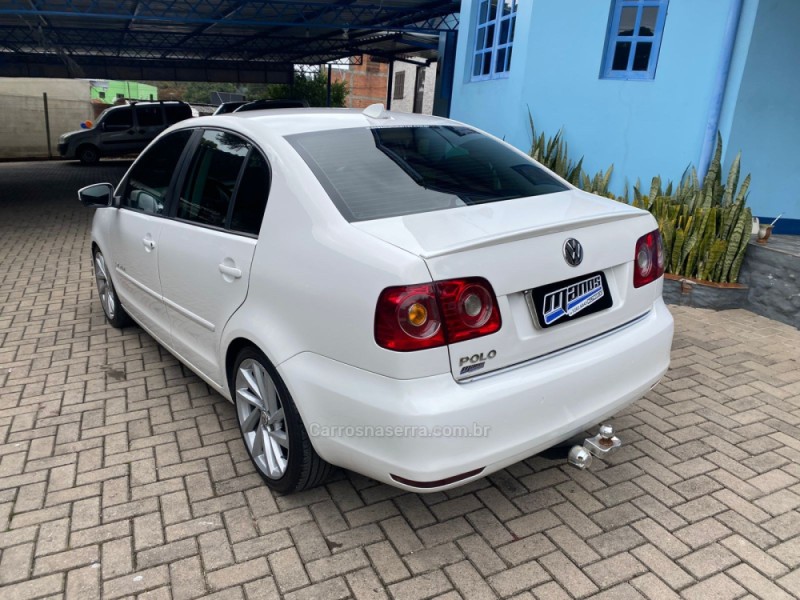 POLO SEDAN 1.6 MI COMFORTLINE 8V FLEX 4P MANUAL - 2013 - CANELA