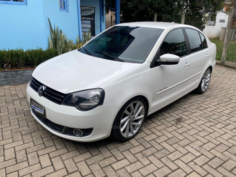 polo sedan 1.6 mi comfortline 8v flex 4p manual 2013 canela