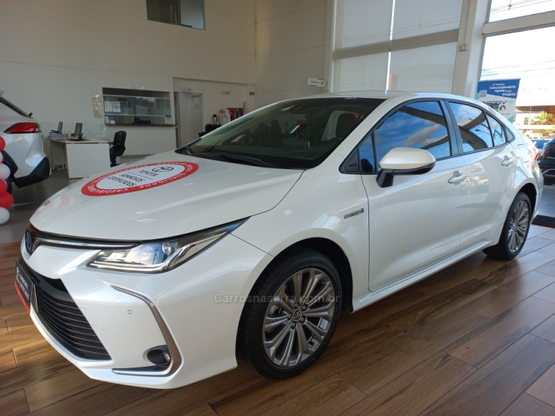 corolla 1.8 altis 16v hibrido 4p automatico 2023 taquara
