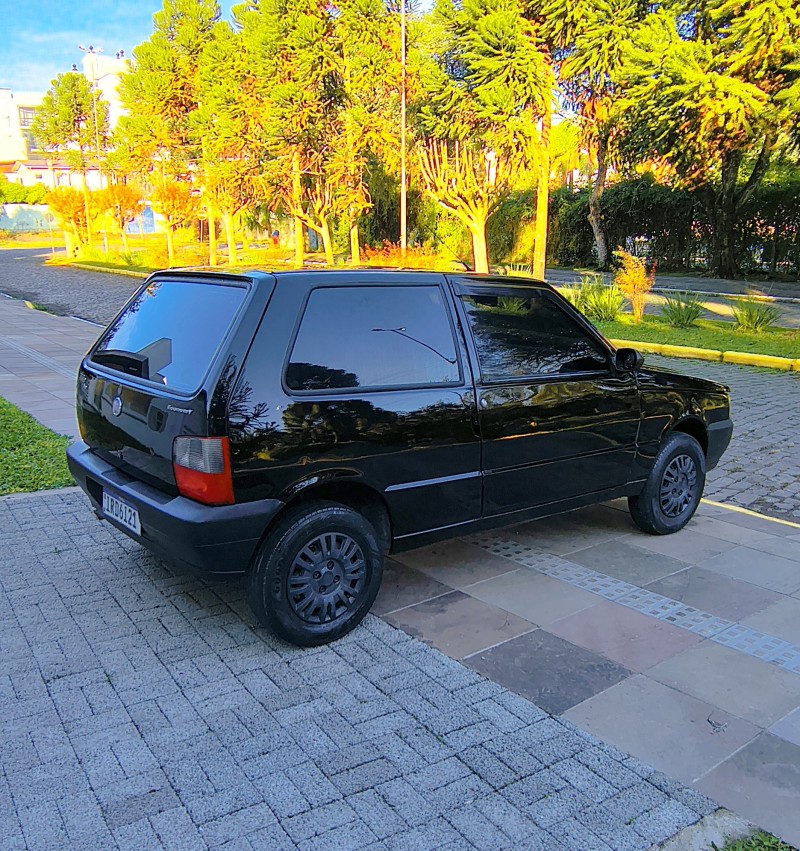 UNO 1.0 MPI MILLE FIRE ECONOMY 8V FLEX 2P MANUAL - 2011 - FARROUPILHA