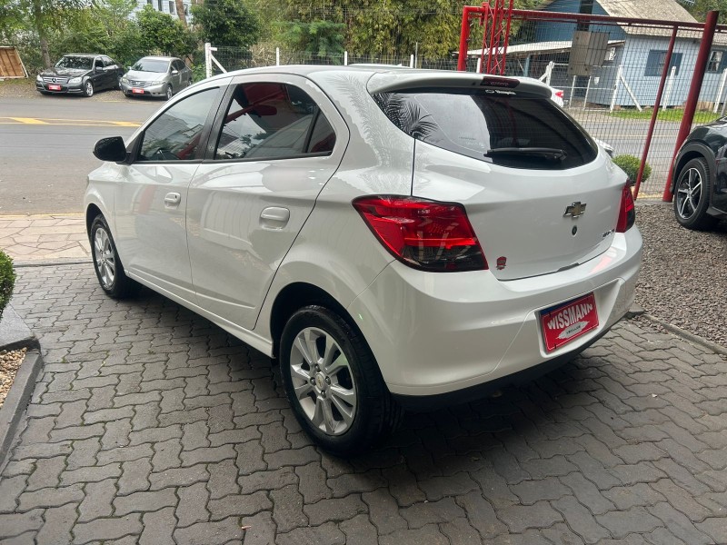 ONIX 1.0 MPFI LOLLAPALOOZA 8V FLEX 4P MANUAL - 2014 - TRêS COROAS