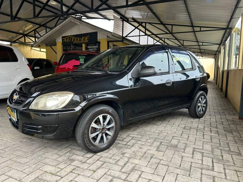 celta 1.0 mpfi spirit 8v flex 4p manual 2010 canela