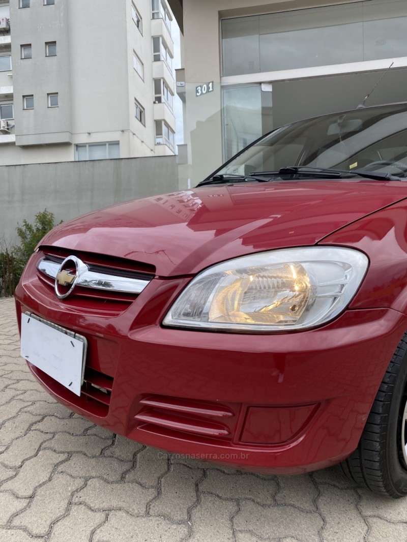 PRISMA 1.4 MPFI MAXX 8V FLEX 4P MANUAL - 2010 - FARROUPILHA