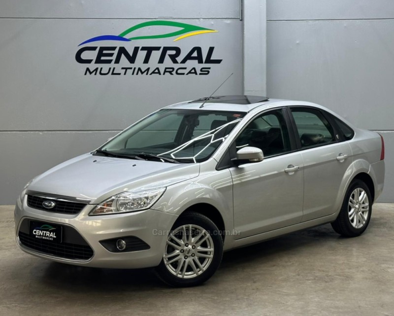 focus 2.0 ghia sedan 16v flex 4p automatico 2010 vacaria