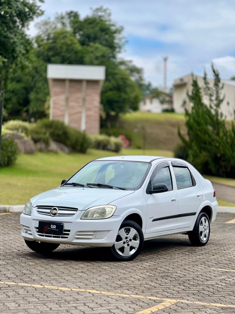PRISMA 1.0 MPFI VHCE MAXX 8V FLEX 4P MANUAL - 2010 - TUPANDI