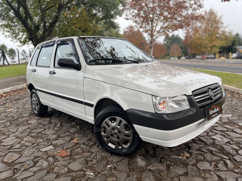 UNO 1.0 MPI MILLE FIRE 8V FLEX 4P MANUAL - 2010 - DOIS IRMãOS