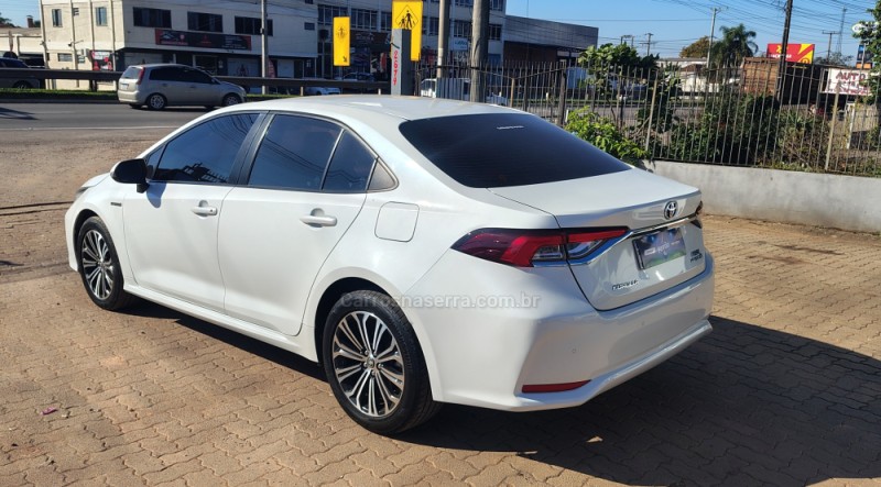 COROLLA 1.8 ALTIS PREMIUM 16V HÍBRIDO 4P AUTOMÁTICO - 2023 - PORTãO