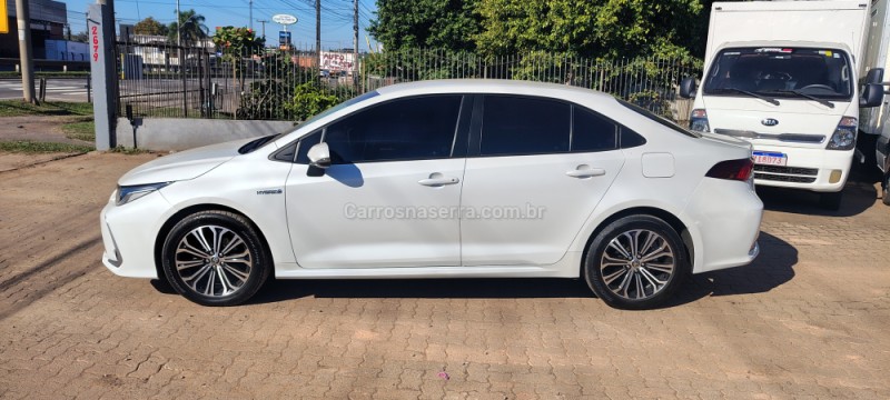COROLLA 1.8 ALTIS PREMIUM 16V HÍBRIDO 4P AUTOMÁTICO - 2023 - PORTãO