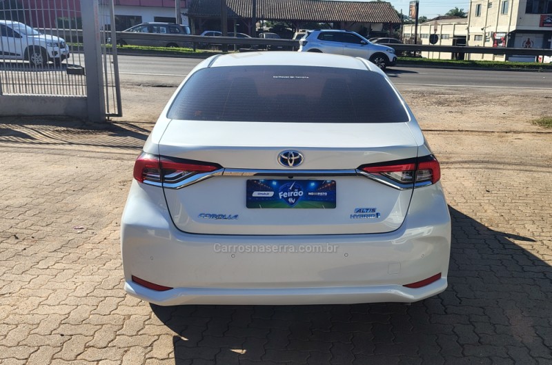 COROLLA 1.8 ALTIS PREMIUM 16V HÍBRIDO 4P AUTOMÁTICO - 2023 - PORTãO
