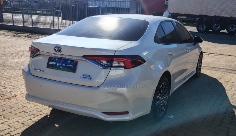 COROLLA 1.8 ALTIS PREMIUM 16V HÍBRIDO 4P AUTOMÁTICO - 2023 - PORTãO