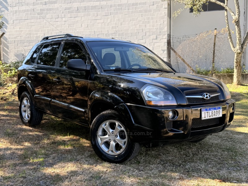 tucson 2.0 mpfi gls 16v 143cv 2wd flex 4p automatico 2013 caxias do sul