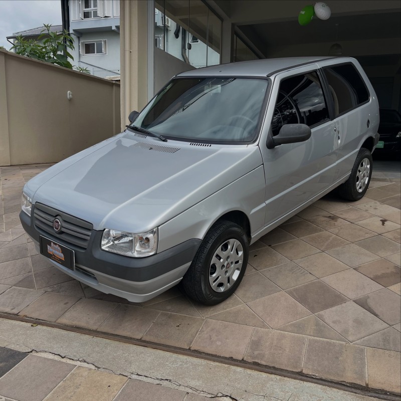UNO 1.0 MPI MILLE FIRE ECONOMY 8V FLEX 2P MANUAL - 2012 - NOVA PETRóPOLIS