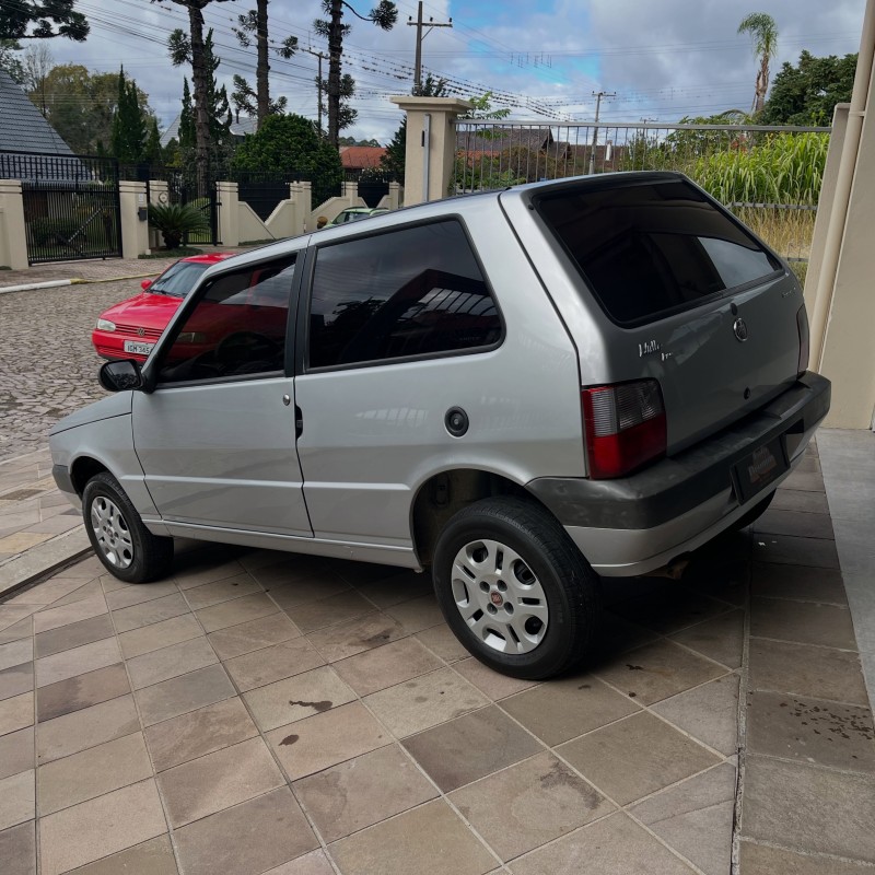 UNO 1.0 MPI MILLE FIRE ECONOMY 8V FLEX 2P MANUAL - 2012 - NOVA PETRóPOLIS