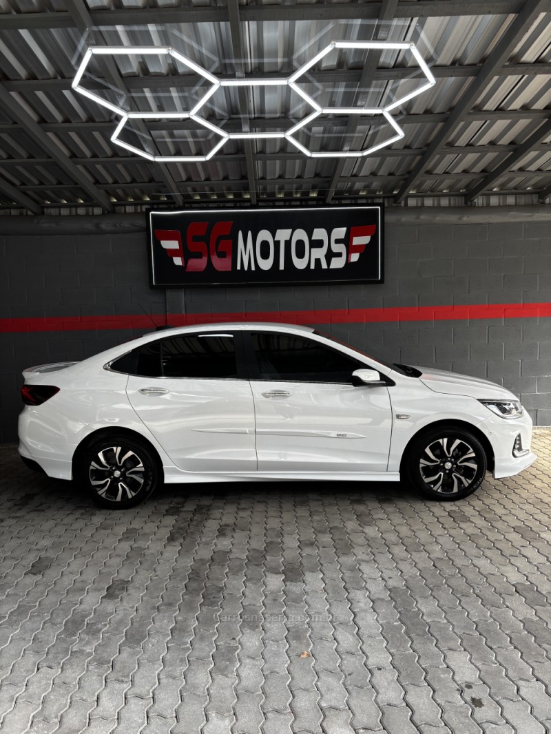 ONIX 1.0 PREMIER II 12V TURBO FLEX 4P AUTOMÁTICO - 2024 - HARMONIA