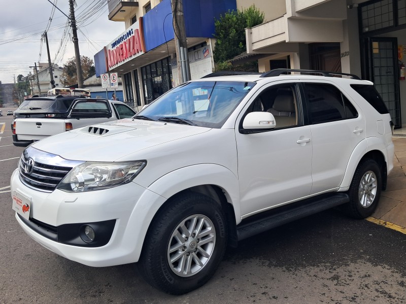 HILUX SW4 3.0 SRV 4X4 7 LUGARES 16V TURBO INTERCOOLER DIESEL 4P AUTOMÁTICO - 2015 - FLORES DA CUNHA
