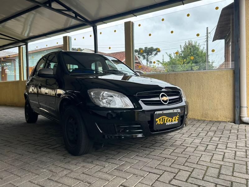 celta 1.0 mpfi ls 8v flex 4p manual 2012 canela