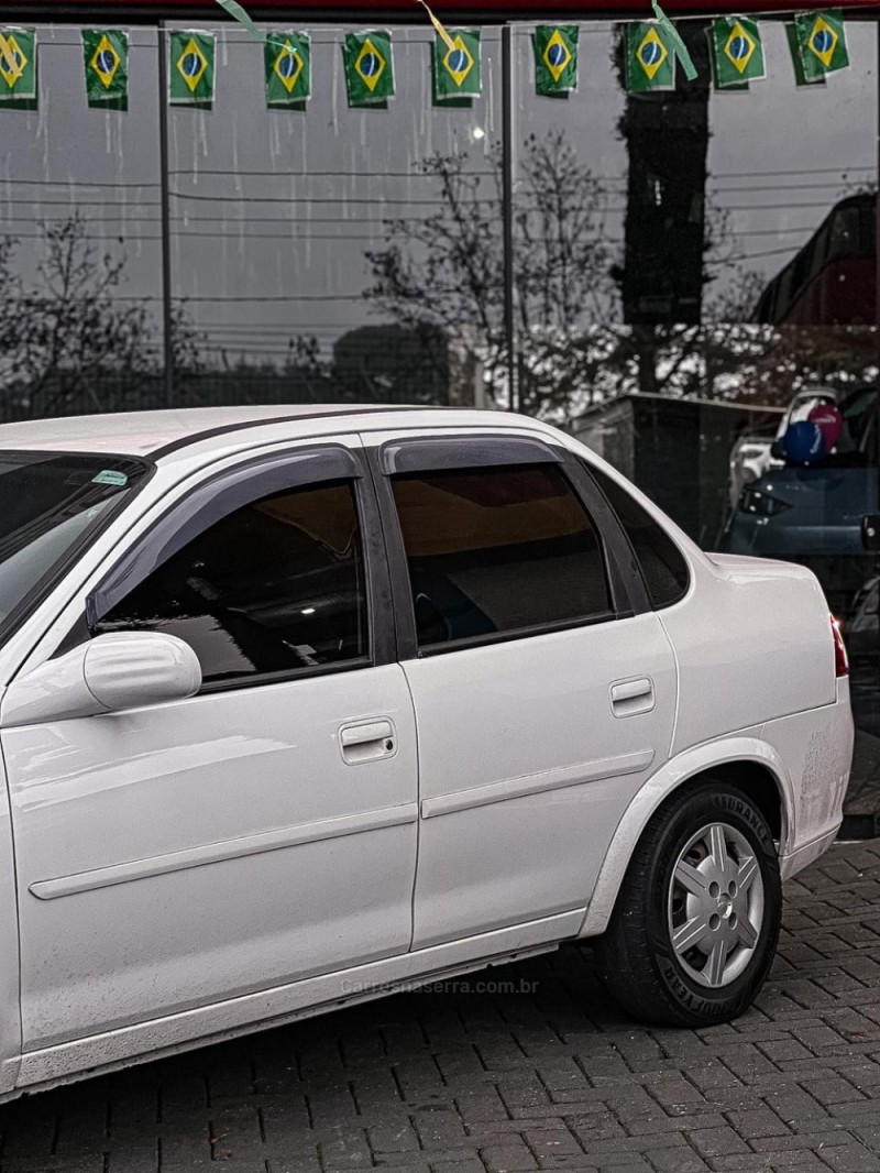 CLASSIC 1.0 MPFI LS 8V GASOLINA 4P MANUAL - 2014 - CANELA