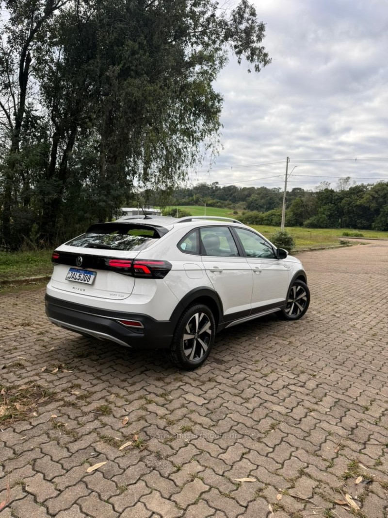 NIVUS 1.0 TSI HIGHLINE FLEX 4P AUTOMÁTICO - 2021 - ARROIO DO MEIO