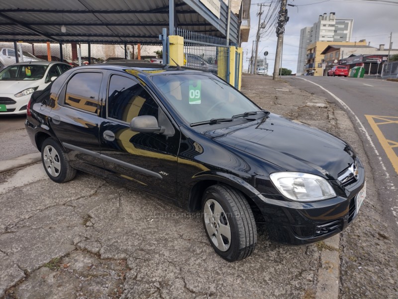 PRISMA 1.4 MPFI JOY 8V FLEX 4P MANUAL - 2009 - CAXIAS DO SUL