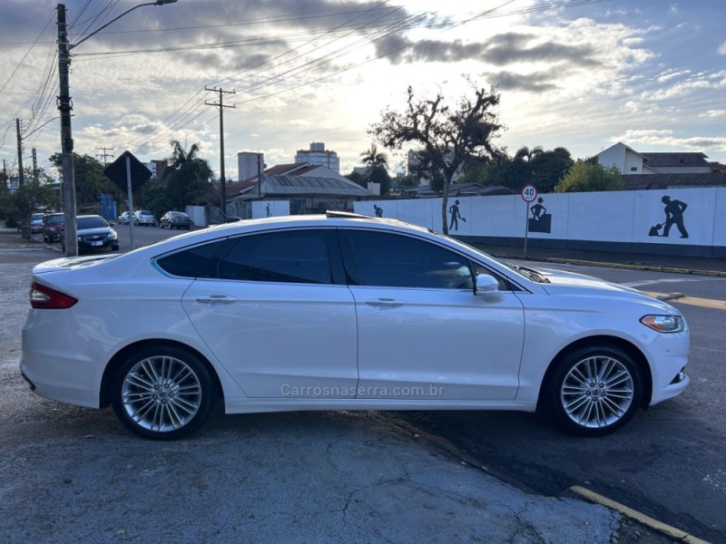 FUSION 2.0 TITANIUM AWD 16V GASOLINA 4P AUTOMÁTICO - 2013 - VENâNCIO AIRES