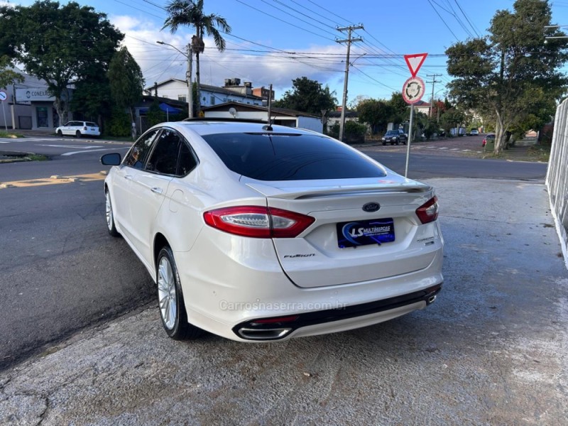 FUSION 2.0 TITANIUM AWD 16V GASOLINA 4P AUTOMÁTICO - 2013 - VENâNCIO AIRES