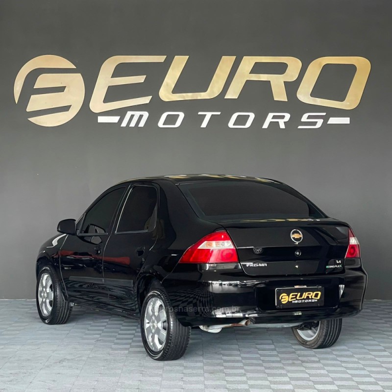 PRISMA 1.4 MPFI MAXX 8V FLEX 4P MANUAL - 2011 - PORTãO