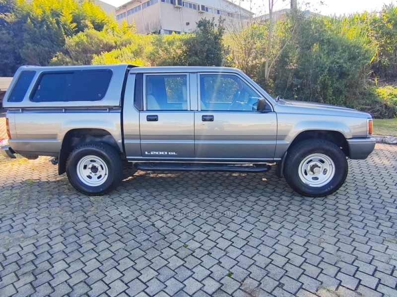 L200 2.5 GL 4X4 CD 8V TURBO DIESEL 4P MANUAL - 1999 - GUAPORé
