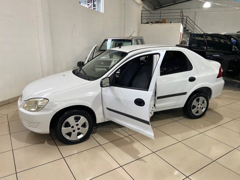 PRISMA 1.4 MPFI JOY 8V FLEX 4P MANUAL - 2010 - NOVA PRATA