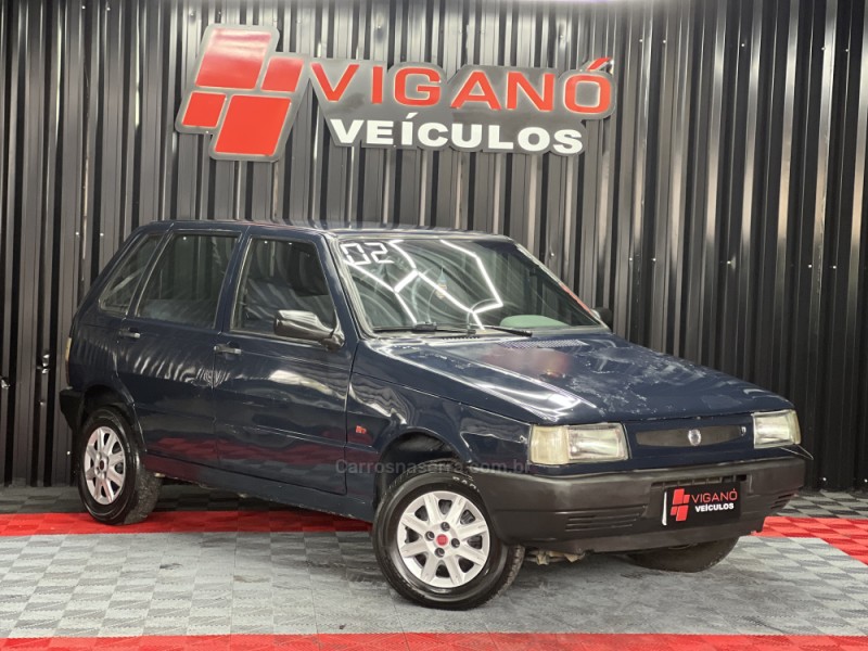UNO 1.0 MPI MILLE FIRE ECONOMY 8V FLEX 4P MANUAL - 2002 - CAXIAS DO SUL