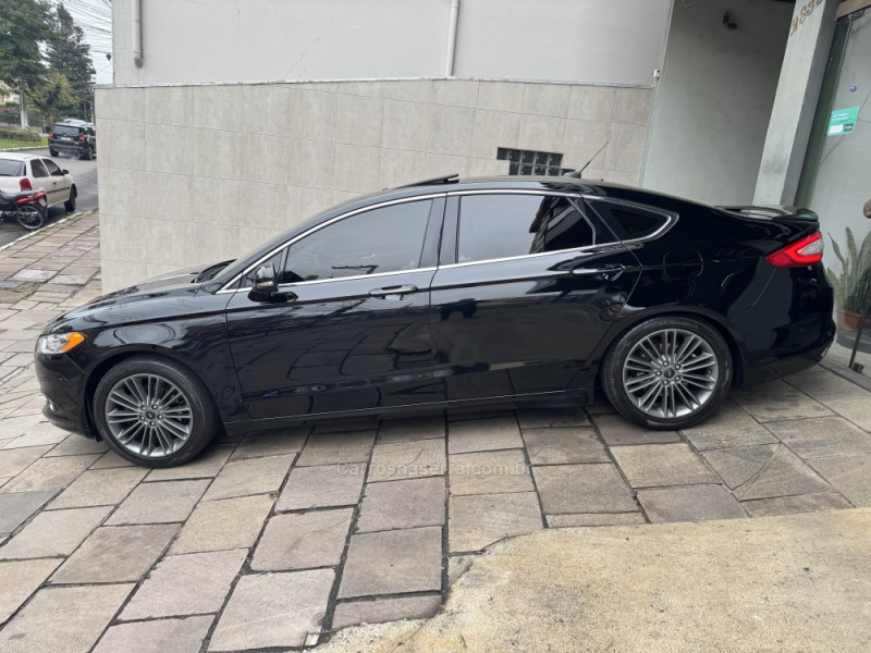 FUSION 2.0 TITANIUM GTDI ECOBOOST AWD AUTOMÁTICO - 2016 - GARIBALDI