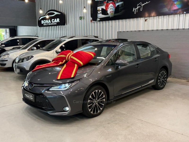 corolla 1.8 altis premium 16v hibrido 4p automatico 2024 caxias do sul