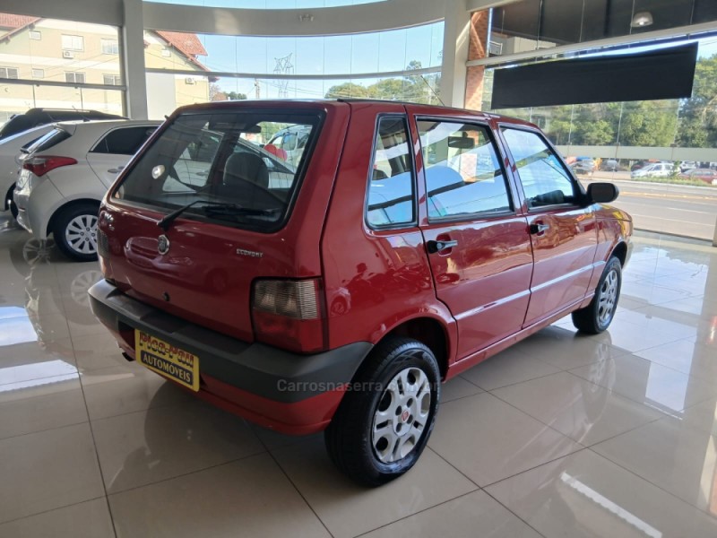 UNO 1.0 MPI MILLE FIRE ECONOMY 8V FLEX 4P MANUAL - 2011 - NOVA PETRóPOLIS