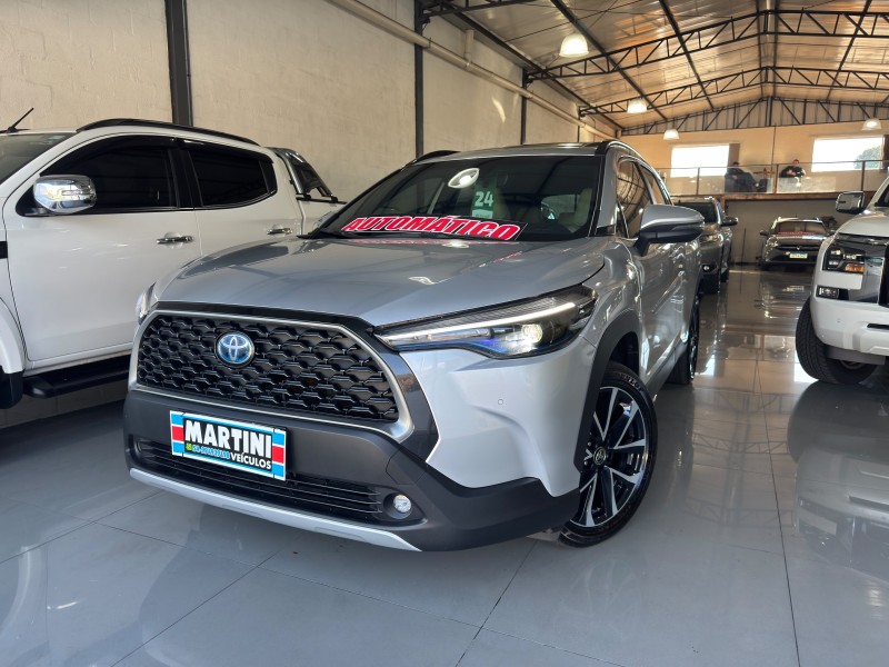 corolla 1.8 cross xrx 16v hibrido 4p automatico 2024 caxias do sul