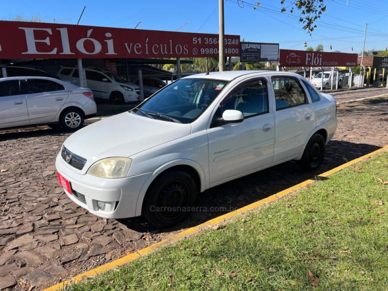 corsa 1.4 mpfi premium 8v flex 4p manual 2009 dois irmaos