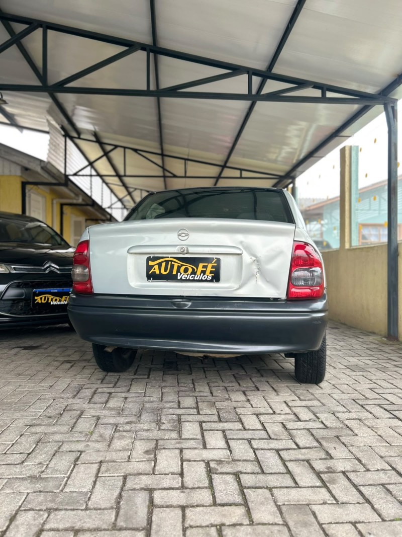 CORSA 1.0 MPFI MILENIUM SEDAN 8V GASOLINA 4P MANUAL - 2002 - CANELA