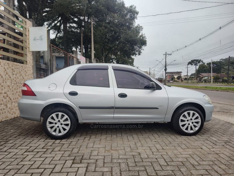 PRISMA 1.4 MPFI JOY 8V FLEX 4P MANUAL - 2009 - CANELA