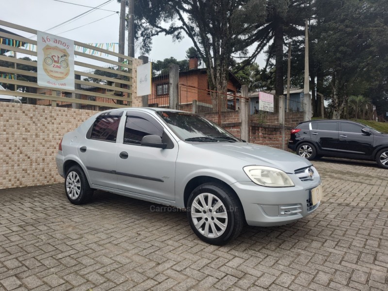 PRISMA 1.4 MPFI JOY 8V FLEX 4P MANUAL - 2009 - CANELA